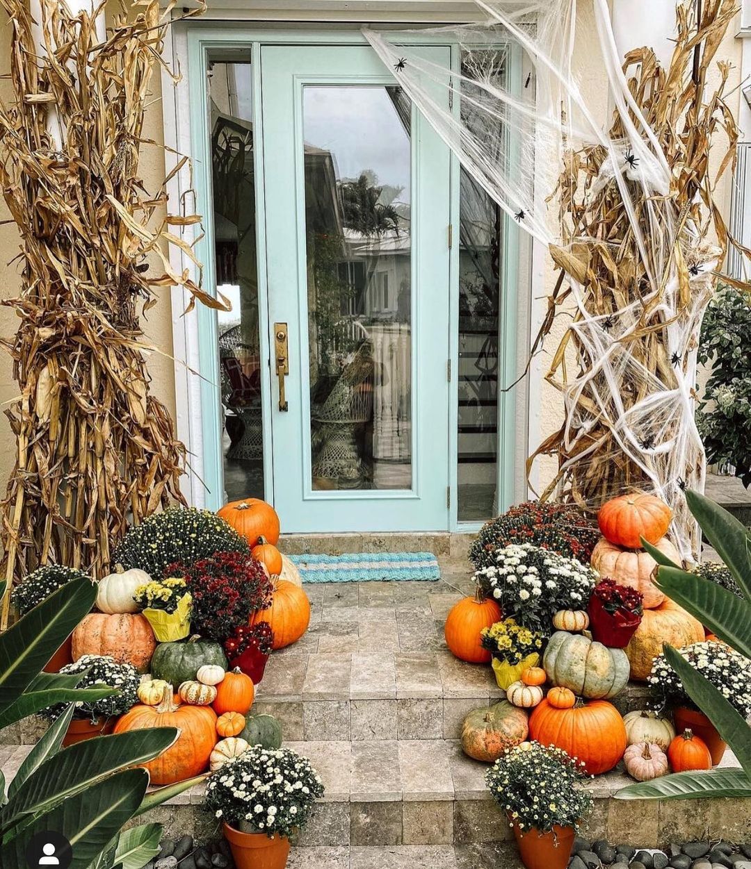 Boho Fall Entryway with Abundant Pumpkins