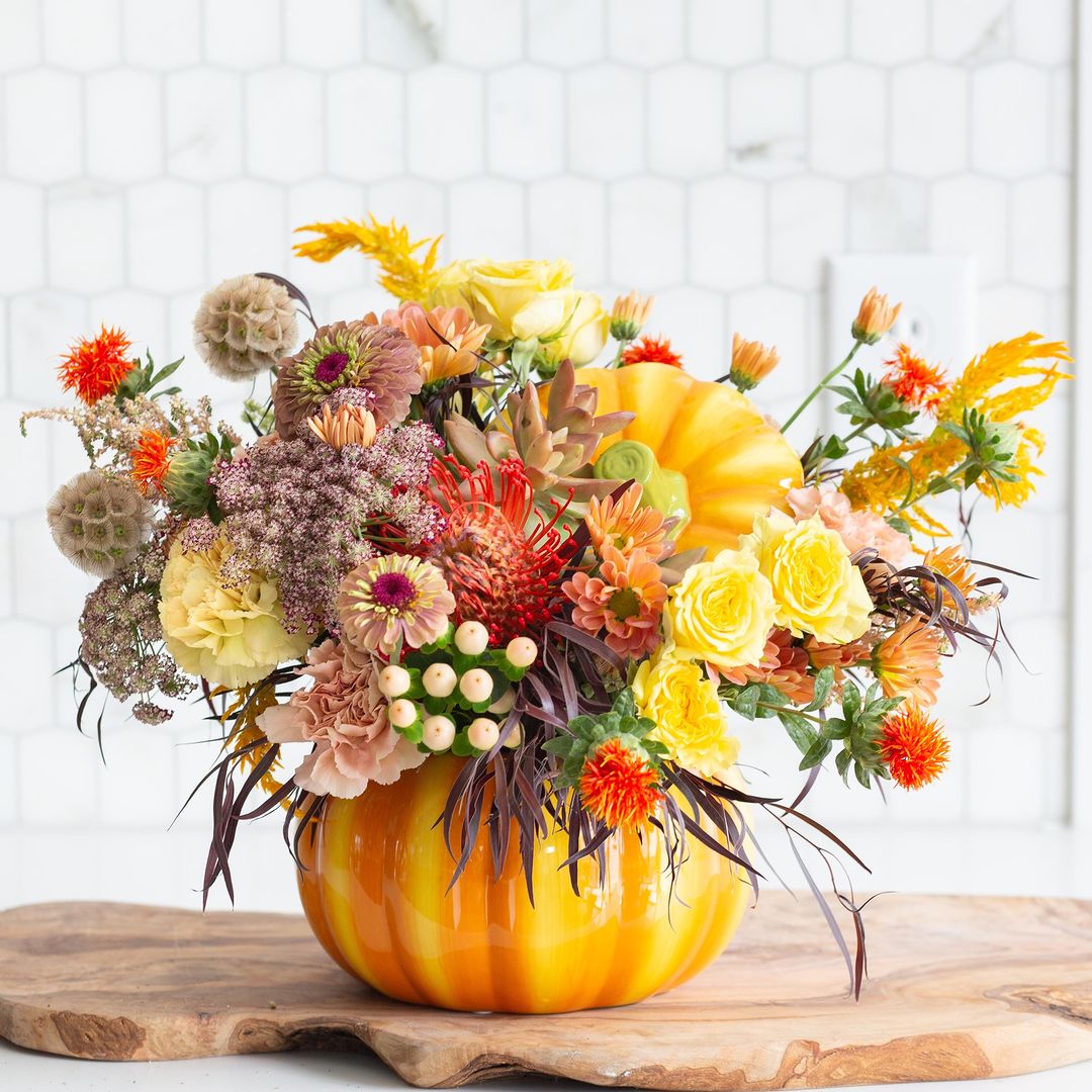 Vibrant Floral Pumpkin Arrangement