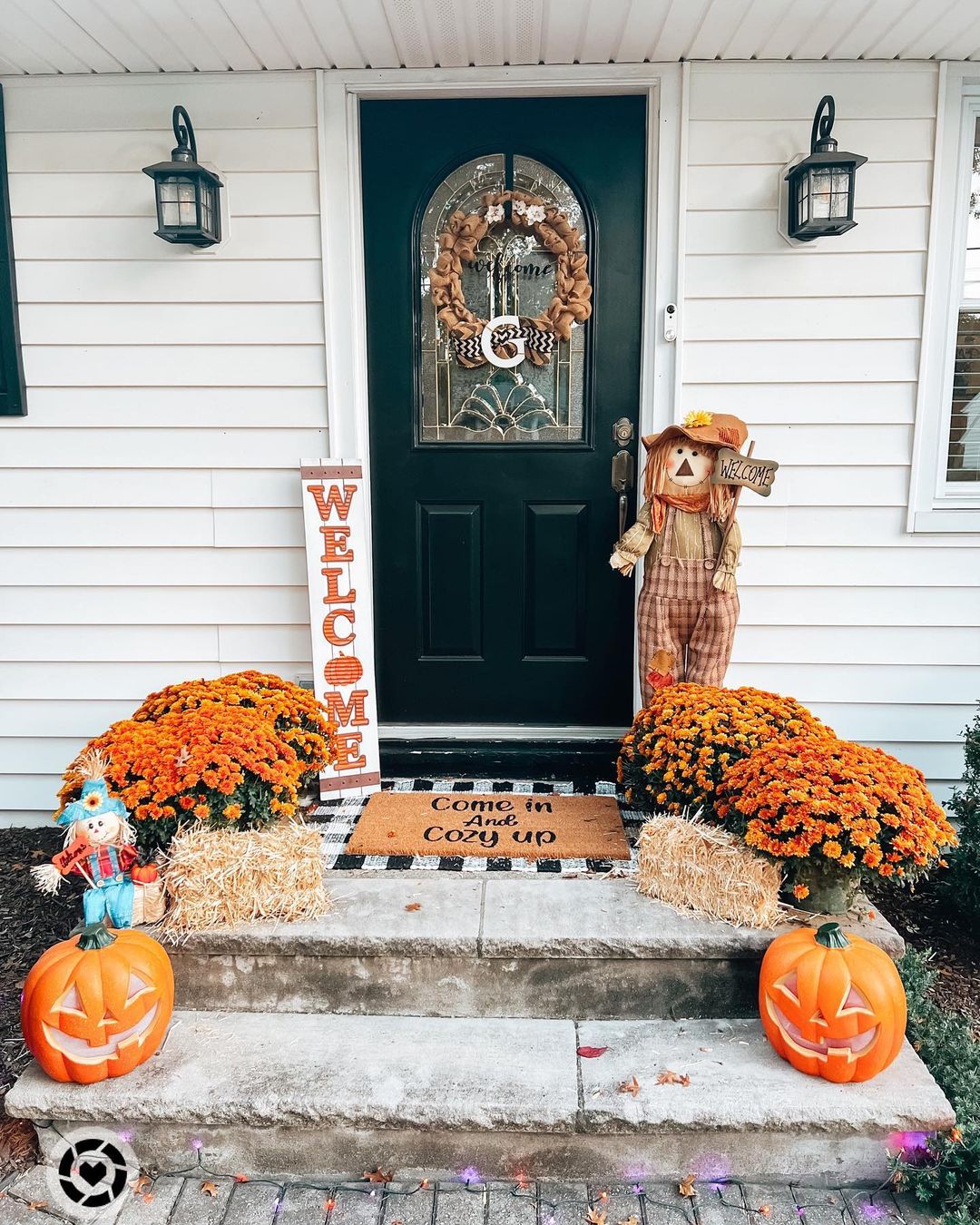 Cozy Fall Porch with Scarecrow and Hay Bales