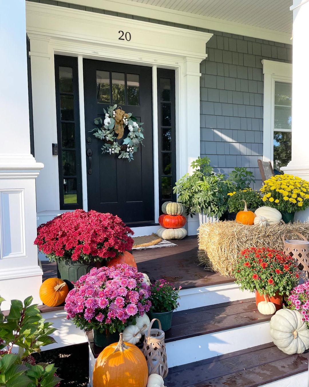 Vibrant Fall Porch with Seasonal Flowers