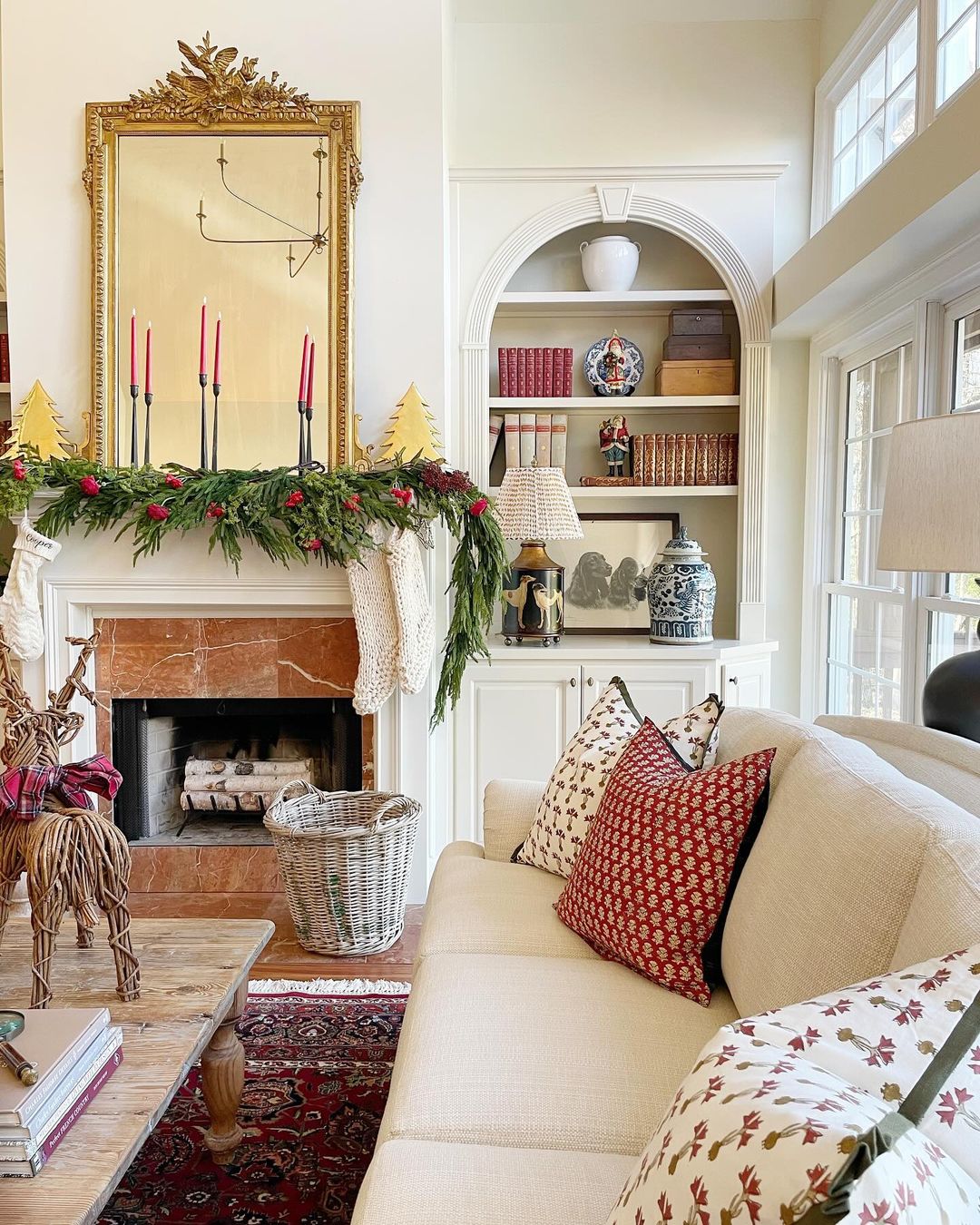 Elegant Christmas Mantel with Red Candles and Greenery