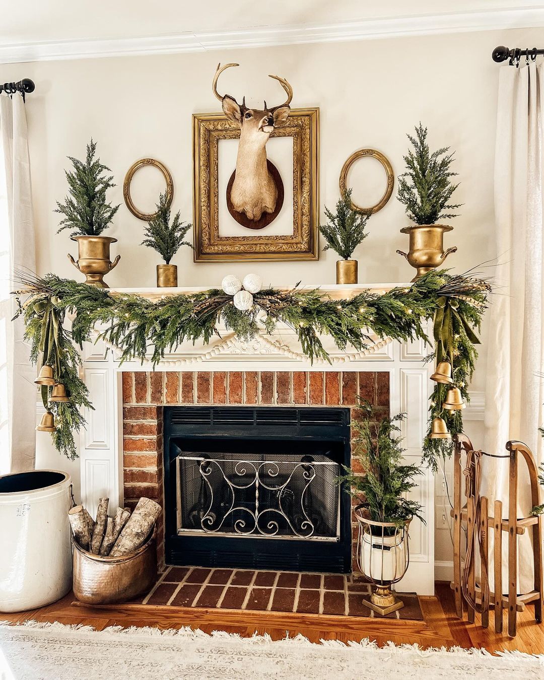 8. Rustic Christmas Mantel with Greenery and Gold Accents