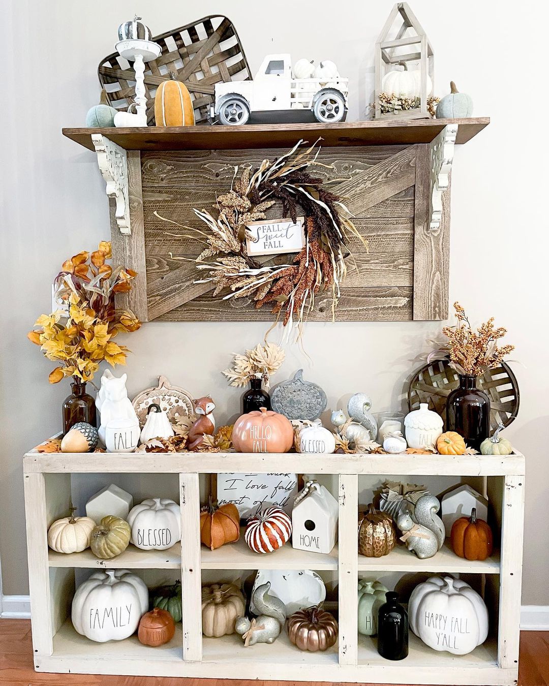 Abundant Fall Display: Layered Decor for a Festive Entryway