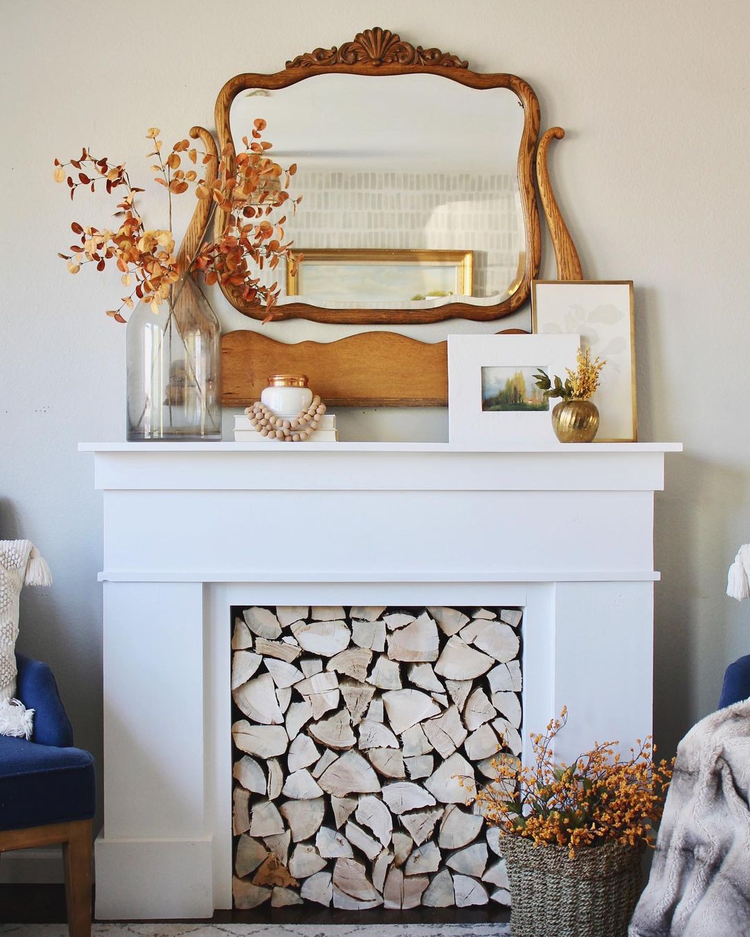 12. Elegant and Minimalist Fall Mantel with Natural Touches