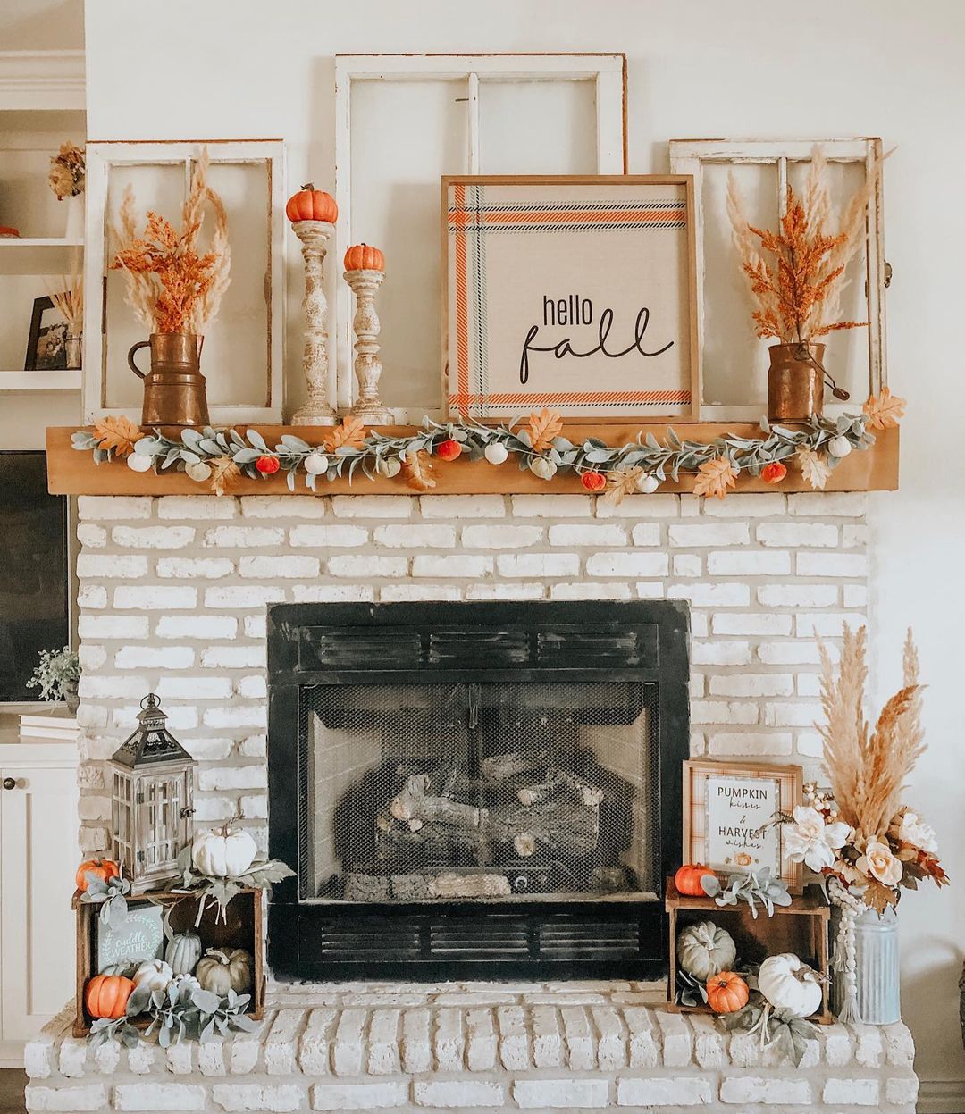 Warm and Welcoming Fall Fireplace with Layered Decor