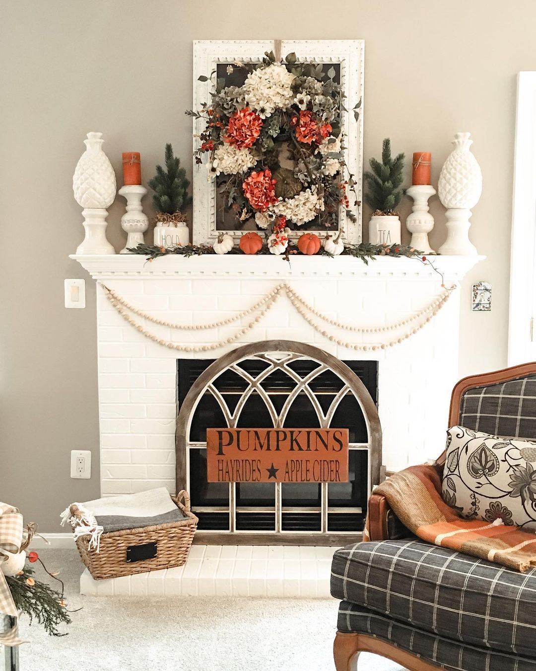 Classic White Fireplace with Vibrant Fall Accents