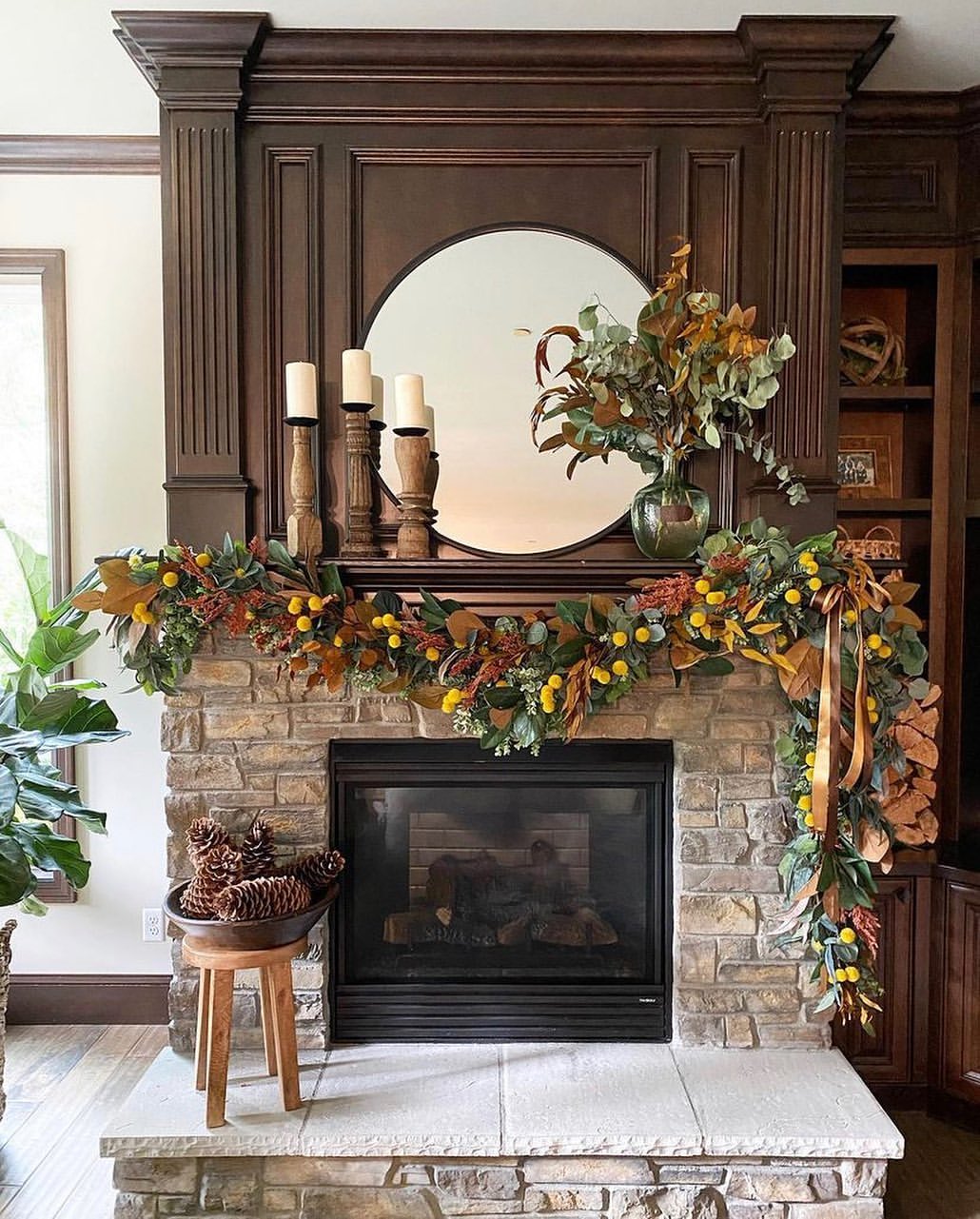 21. Rustic Elegance with Lush Garland and Warm Tones