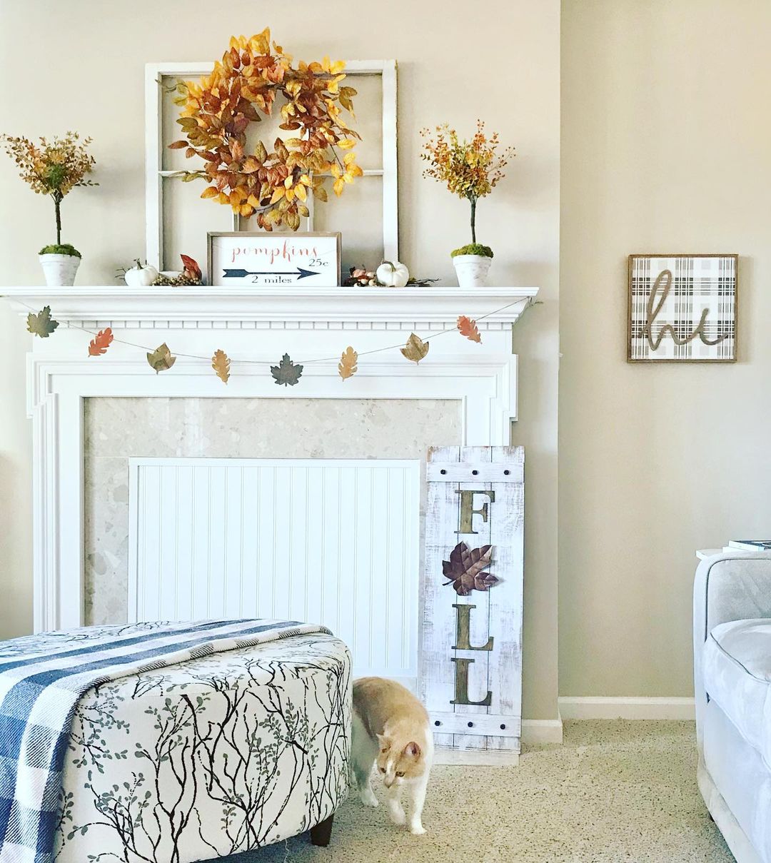 Classic Fall Mantel with Leafy Accents and Warm Tones