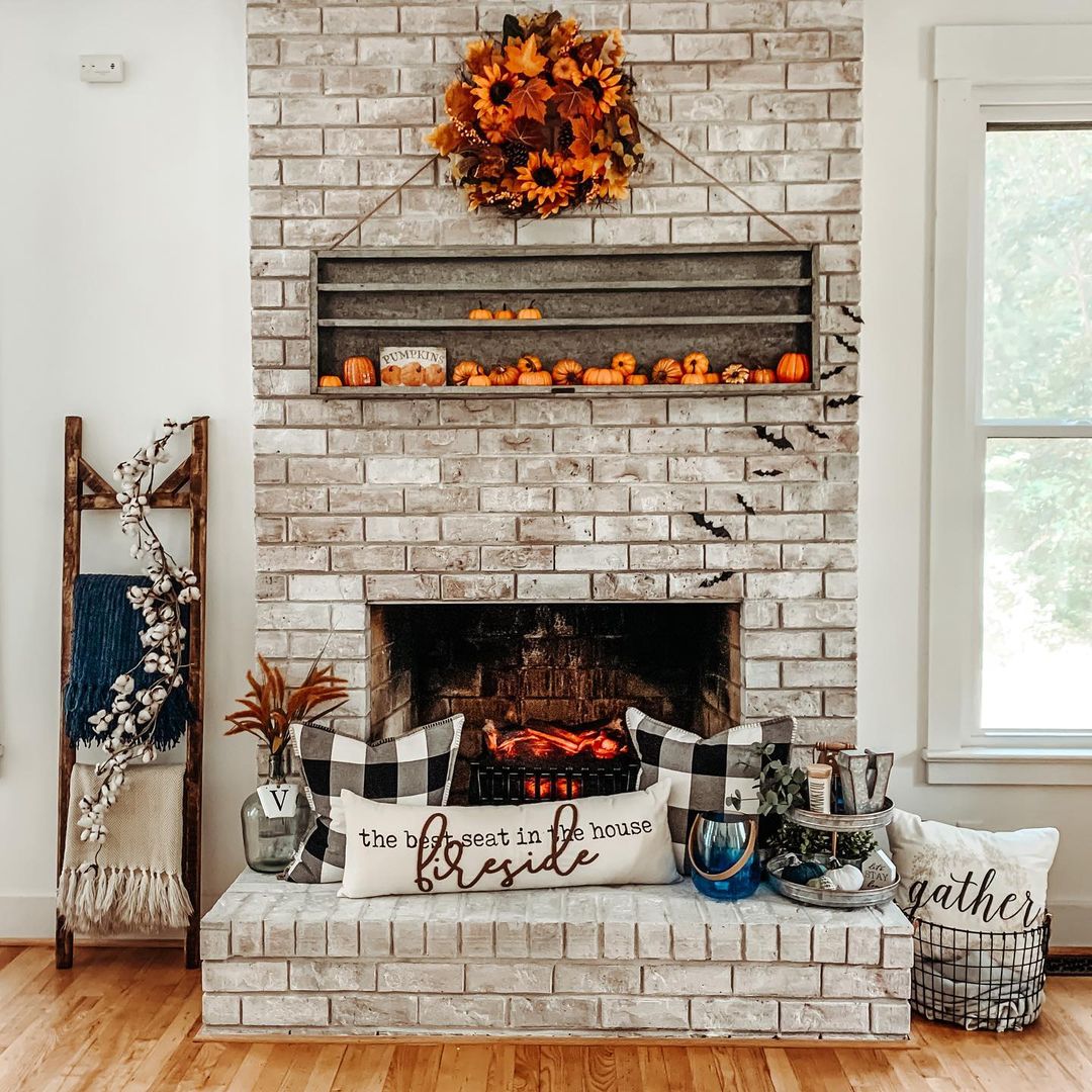 3. Rustic Fall Fireplace with Cozy Textiles and Seasonal Accents