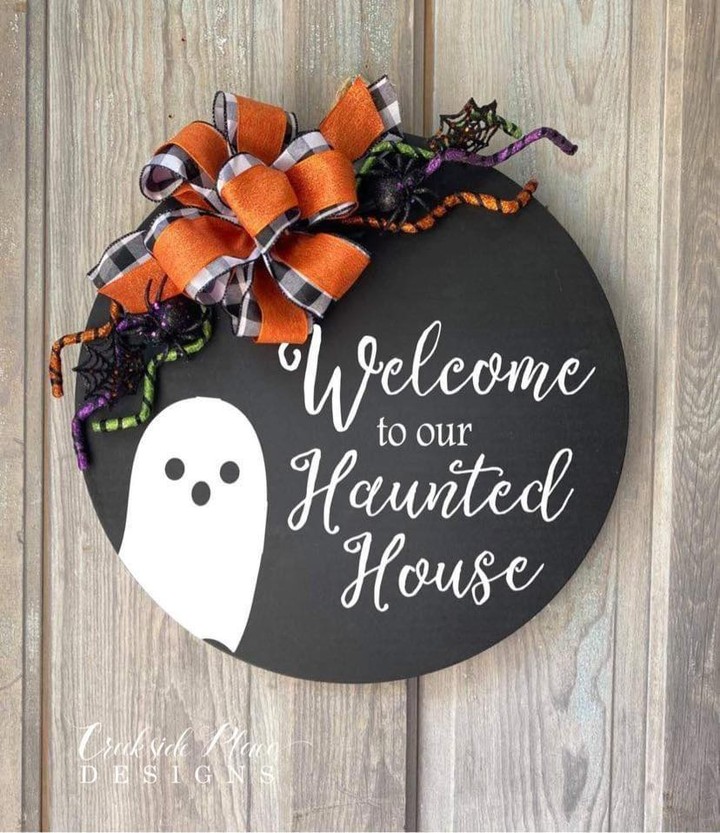 Playful and Welcoming Haunted House Sign with a Pop of Color