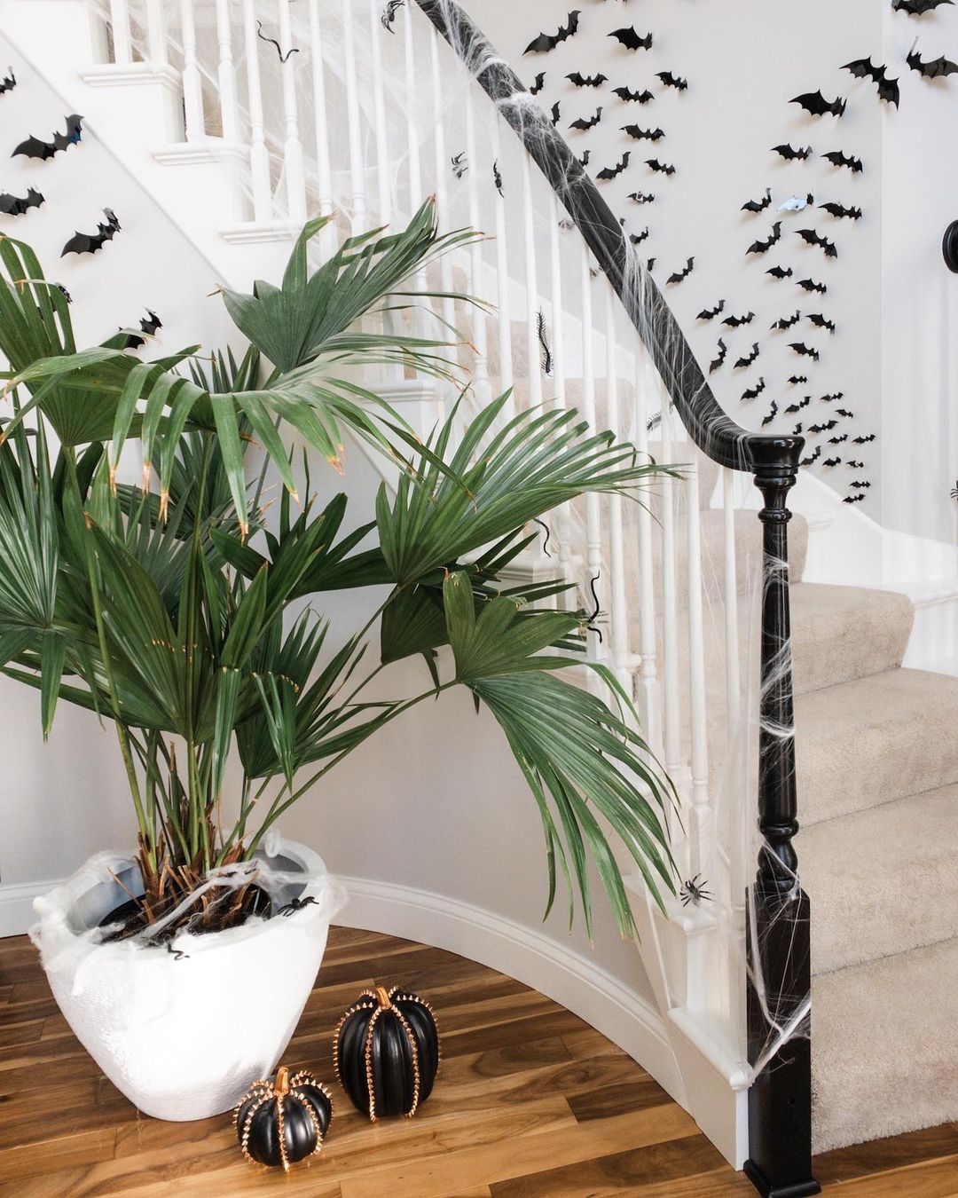 Spooky-Chic Staircase with Bats and Webbed Details