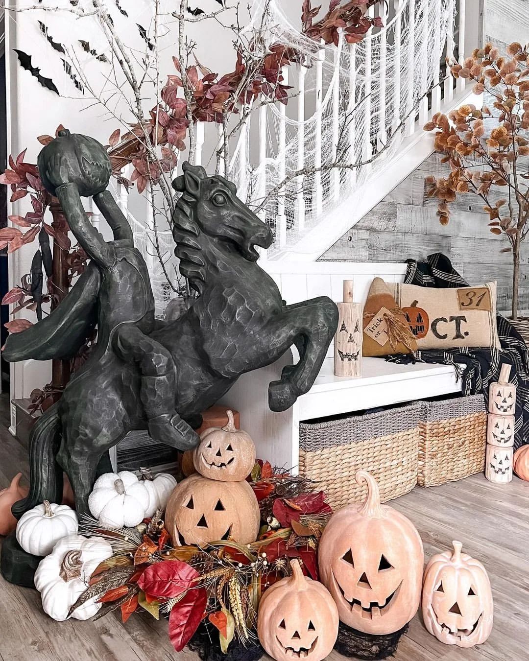 Dramatic Halloween Staircase with Headless Horseman and Pumpkin Display