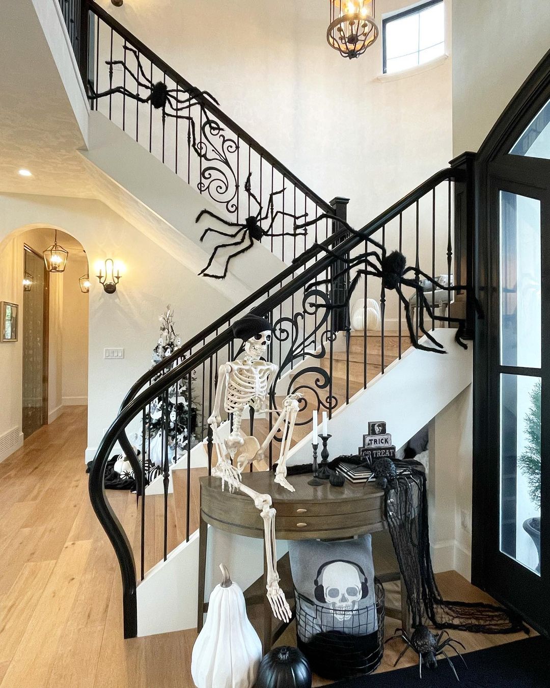 Spooky Staircase with Giant Spiders and Skeleton Decor