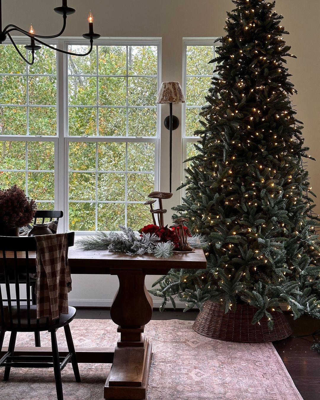 Simple and Elegant Dining Space with Tall Christmas Tree