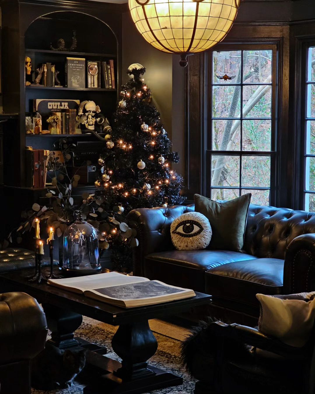 Dark-Themed Living Room with Gothic Christmas Tree