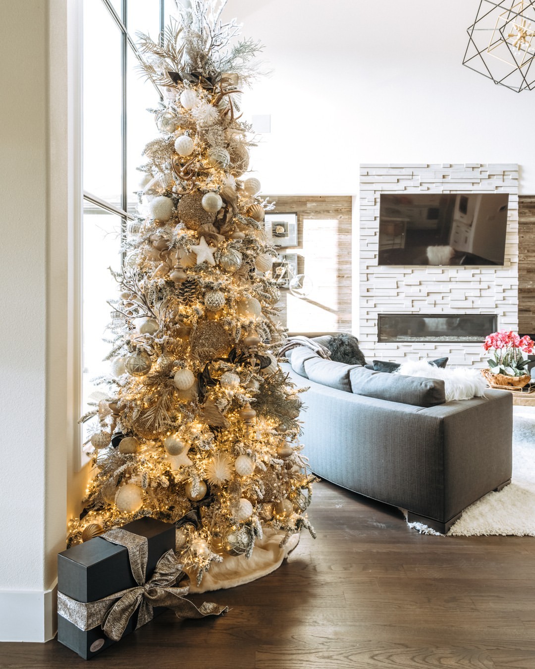 Illuminate Your Living Room with a Stunning White and Gold Christmas Tree