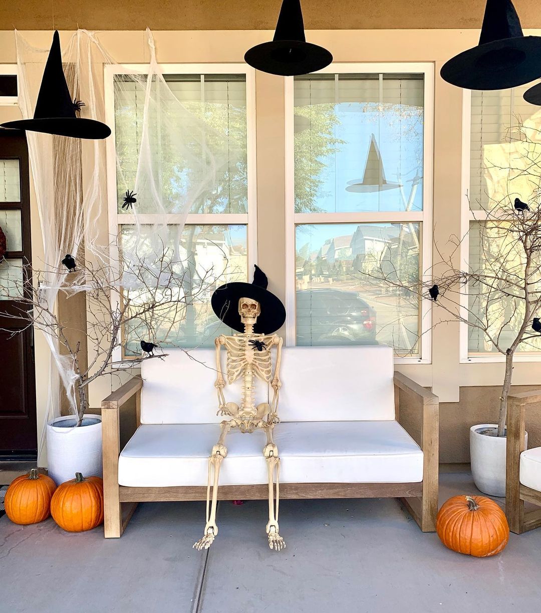 Witchy Skeleton and Floating Hats for a Bewitching Porch