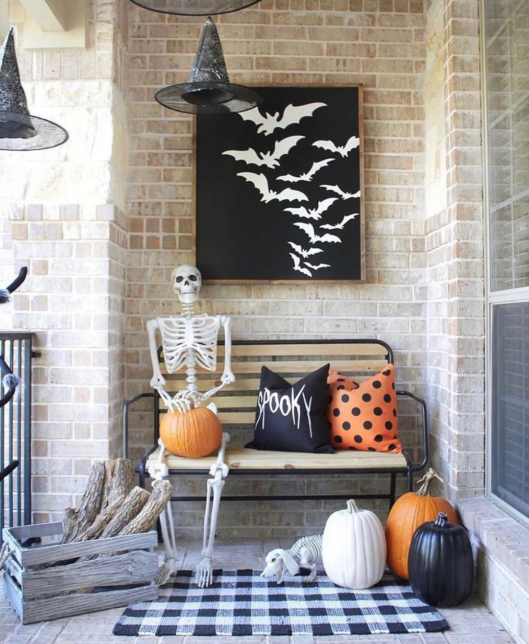 Spooky Skeleton Bench Display with Bats and Pumpkins