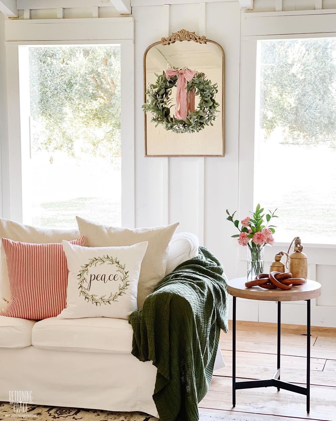 Elegant Christmas Couch with Subtle Wreath Accents