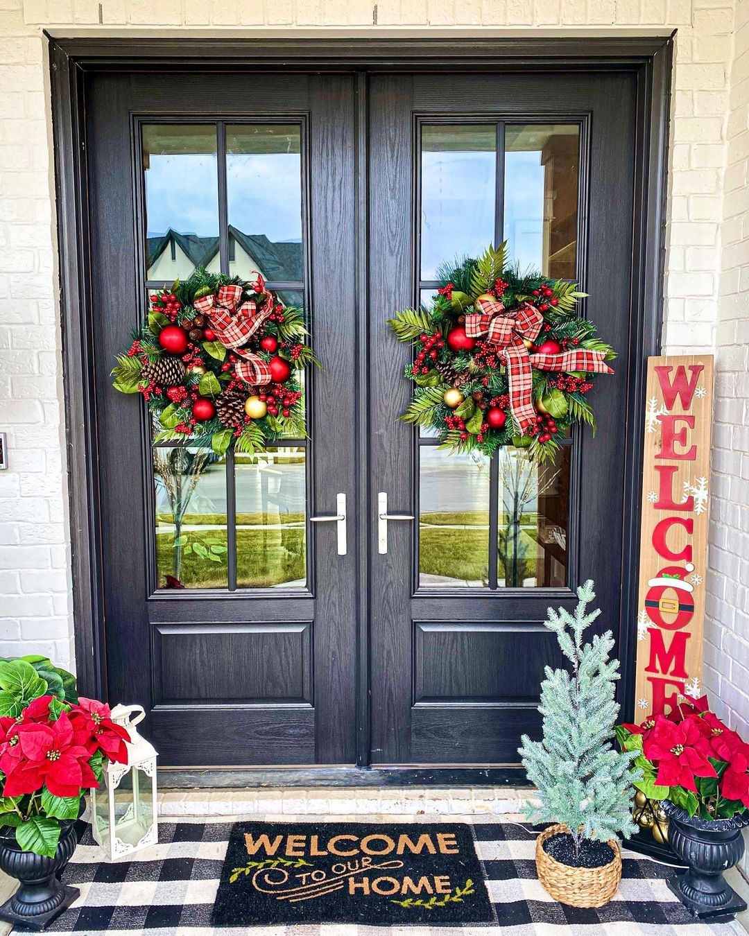 Bold and Bright Entryway with Matching Wreaths and Plaid Accents