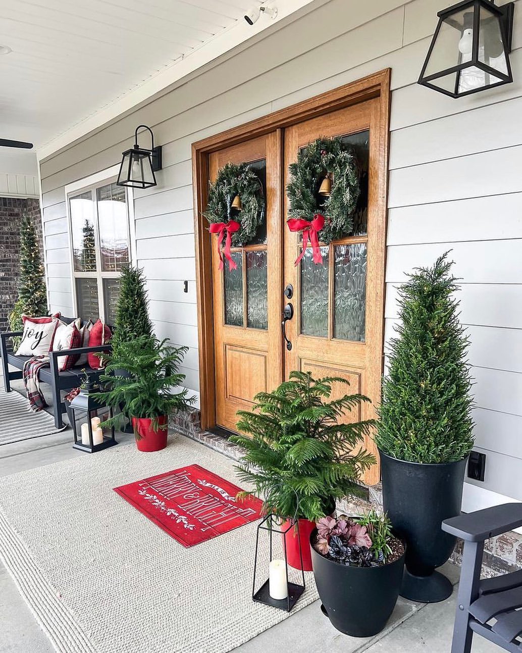 Classic Christmas Porch with Red Accents and Evergreen Decor