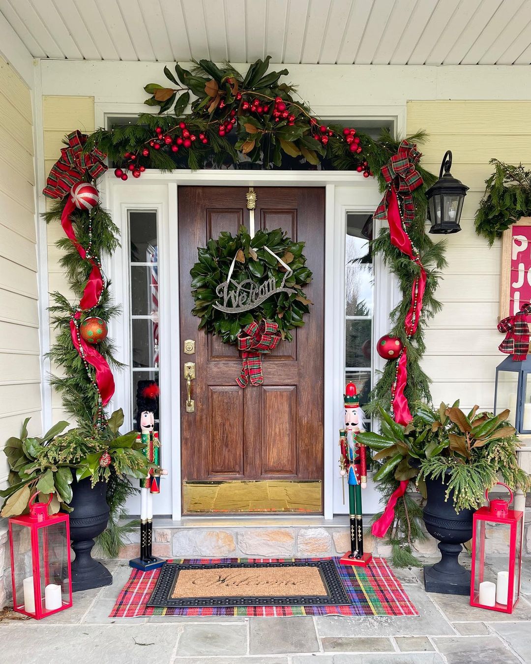 Festive Front Porch with Nutcrackers and Bold Plaid Accents