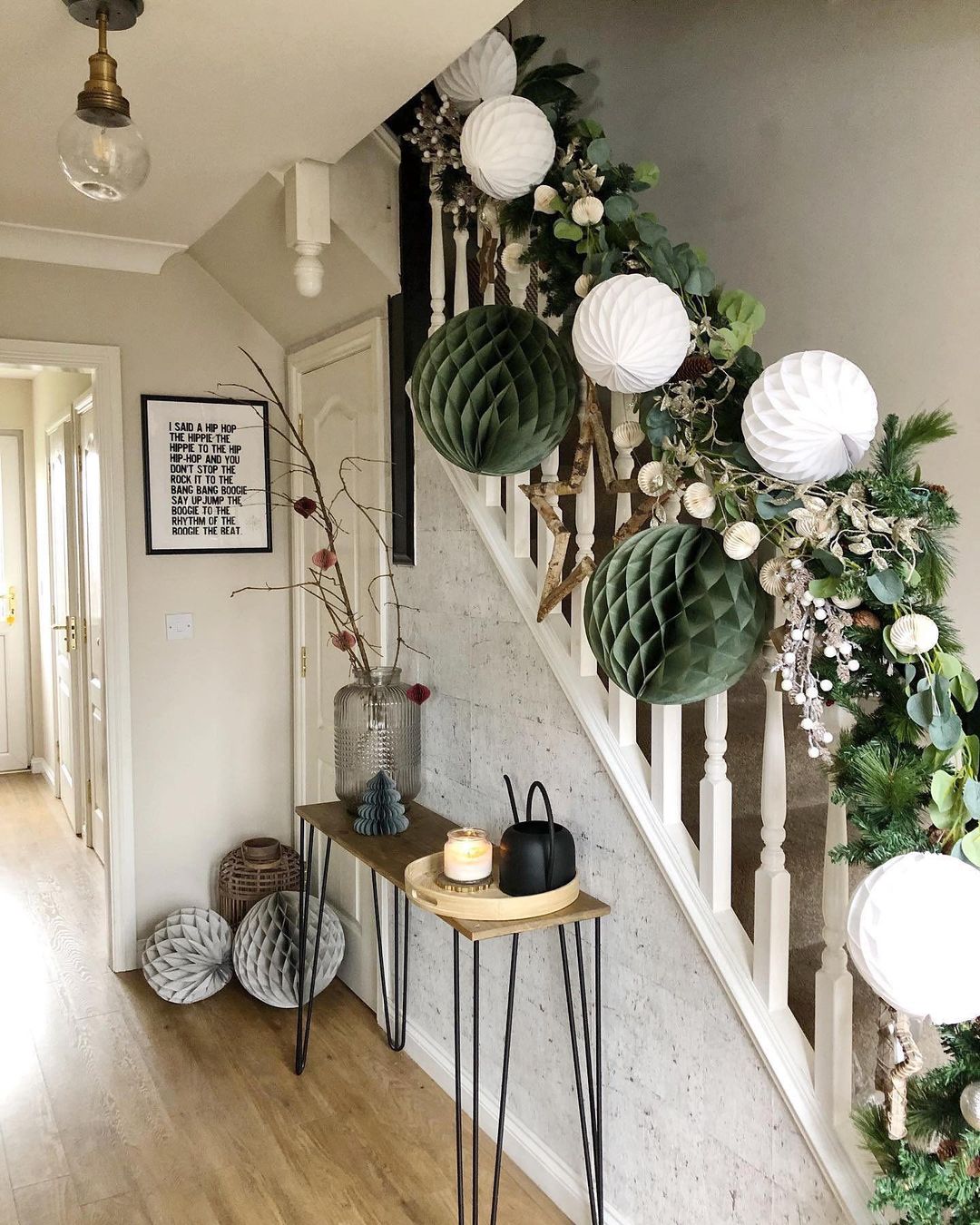 Modern Paper Lanterns and Green Garland for a Stylish Entryway