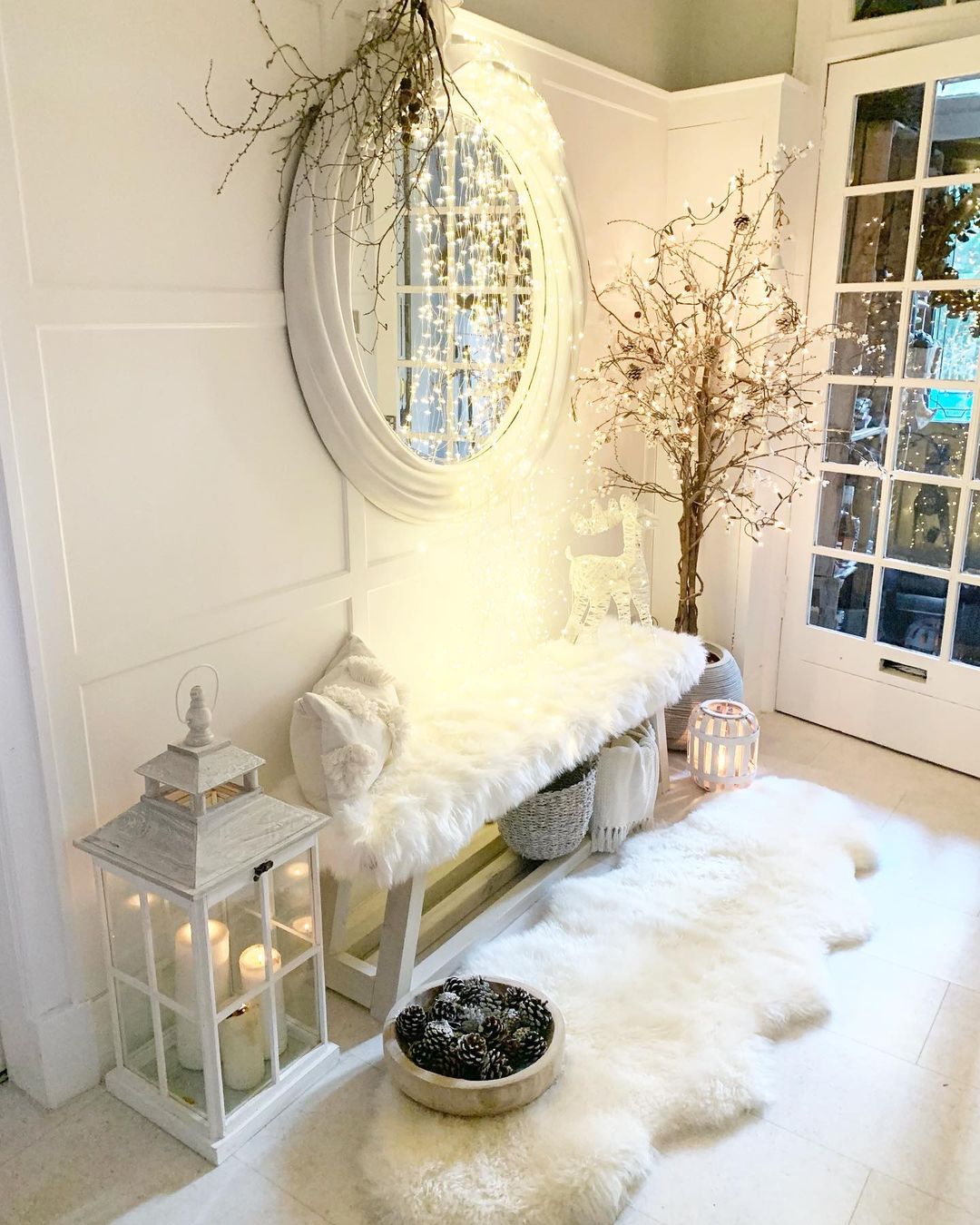 Soft Winter Wonderland Entryway with Cozy Whites and Twinkling Lights