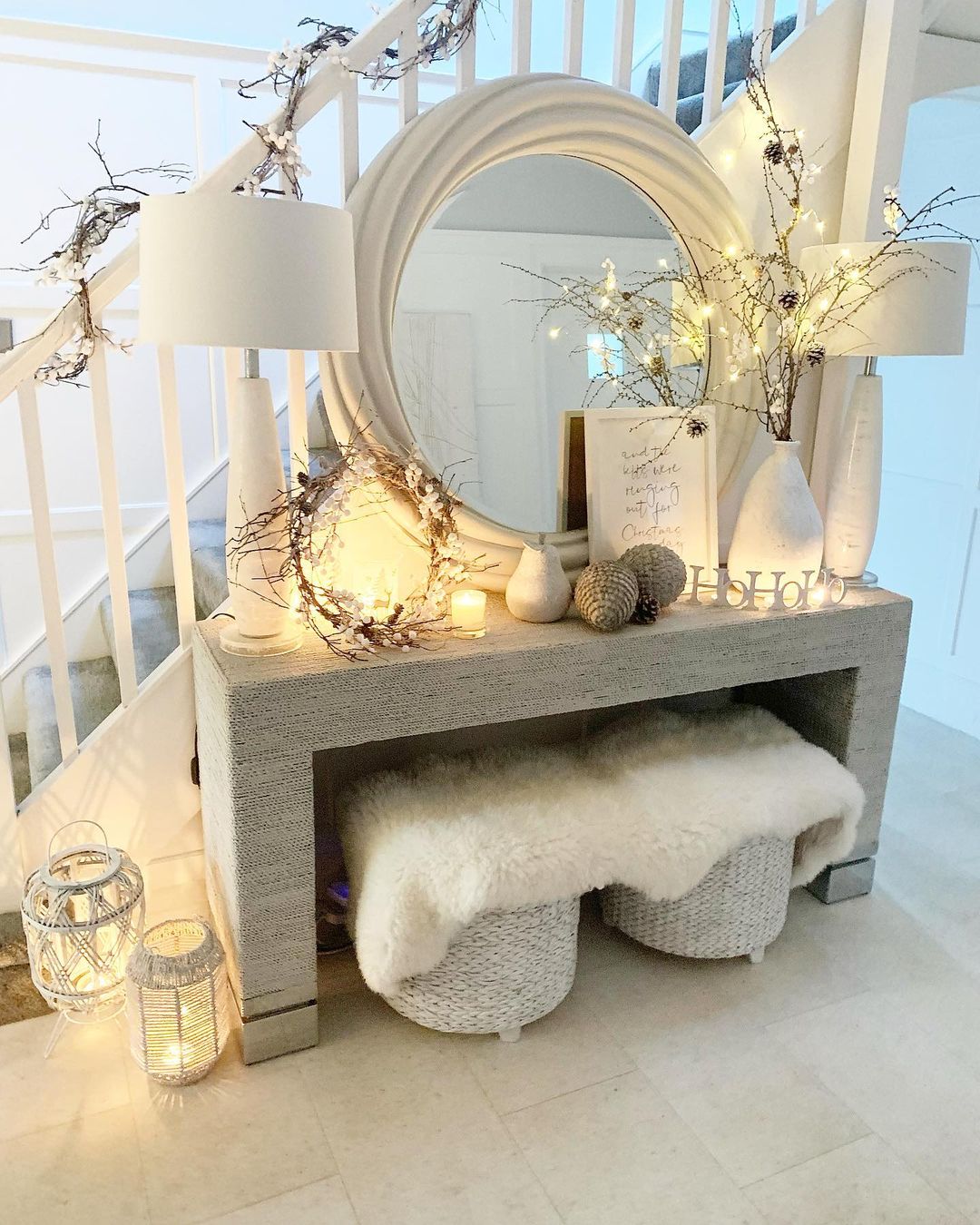 Cozy Neutral Entryway with Twinkling Branches for a Winter Glow