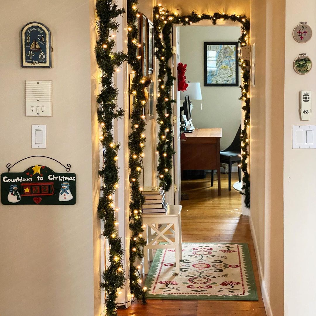 Brighten Up a Narrow Hallway with Simple Greenery and Festive Lights