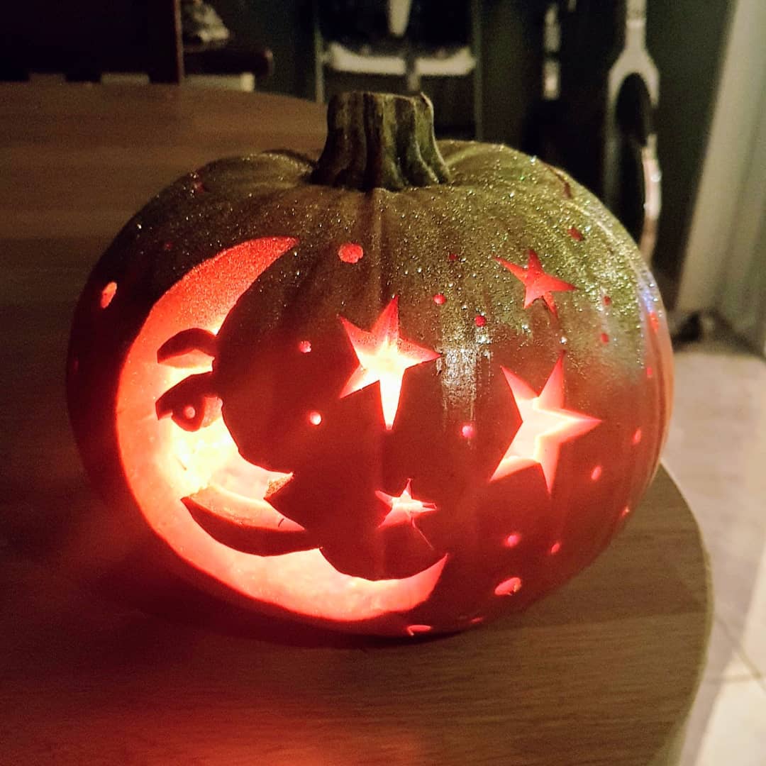 Celestial Moon and Stars Pumpkin for a Magical Halloween Glow