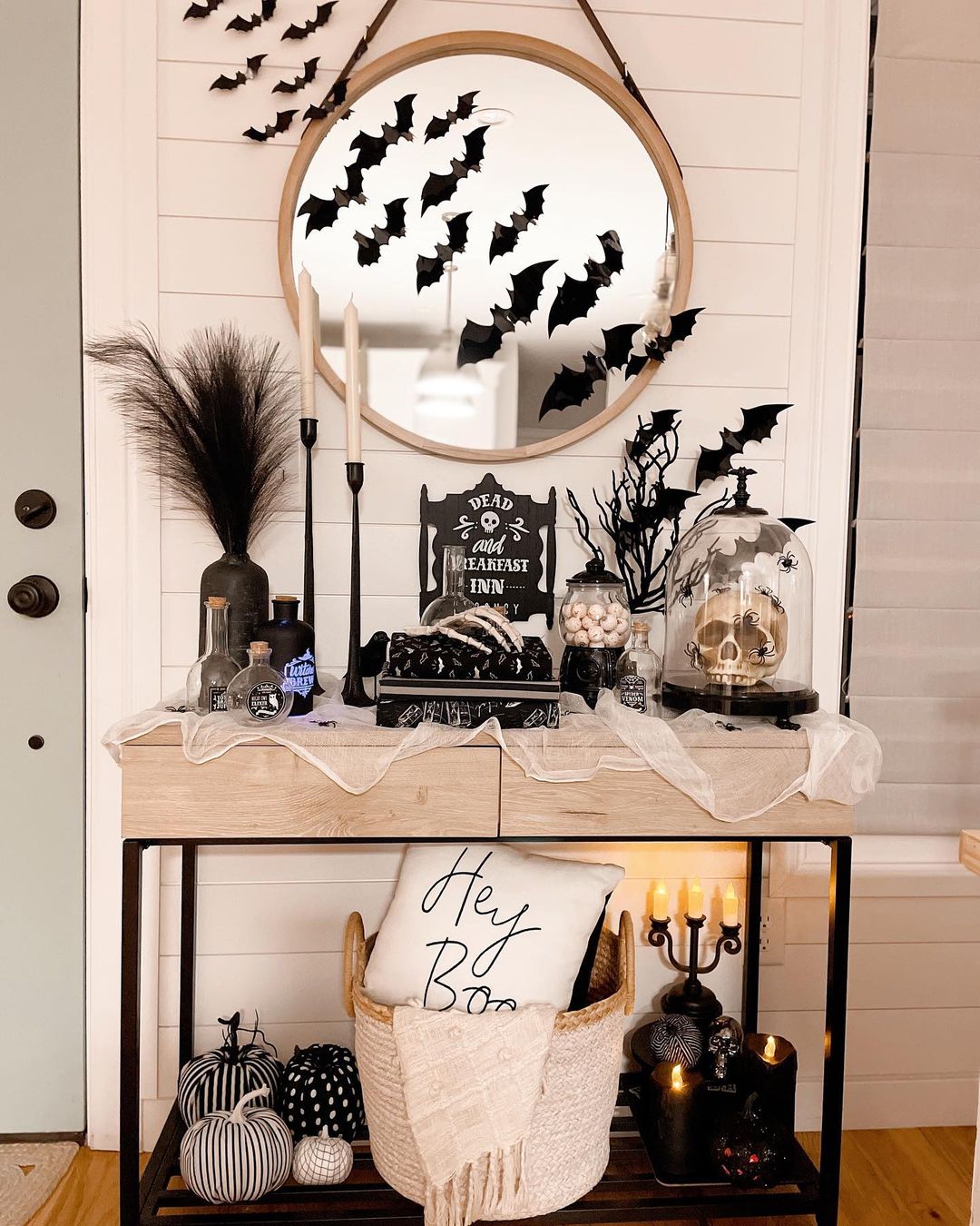 Spooky Halloween Entryway with Bats and Gothic Decor