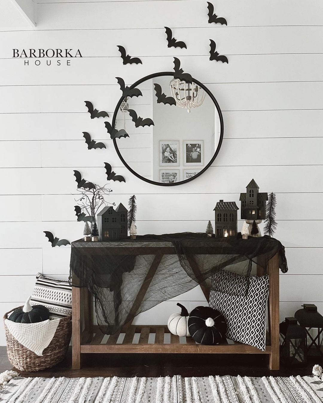 Minimalist Halloween Entryway with Bats and Black Accents