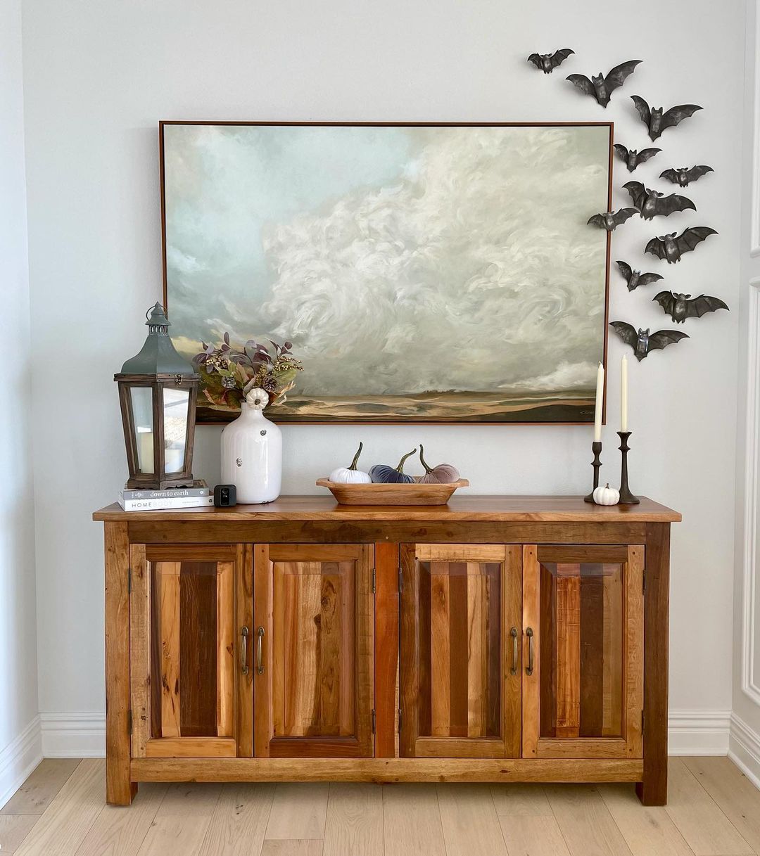 Elegant Console Table with Bats and Earthy Tones