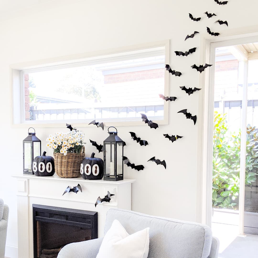 Bright and Airy Halloween Decor with Bats and Boo Pumpkins