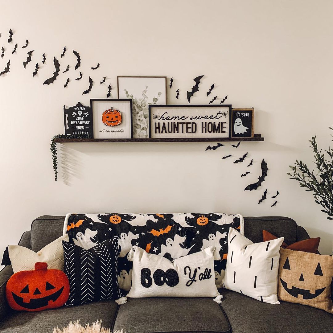 Cozy Halloween Living Room with Bats and Festive Pillows