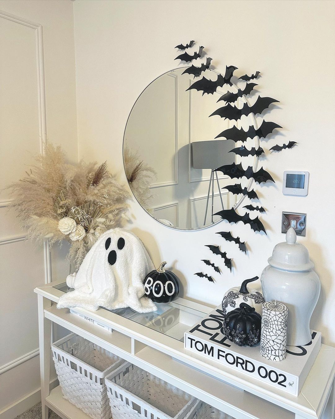 Modern Halloween Entryway with Bats and Monochrome Decor