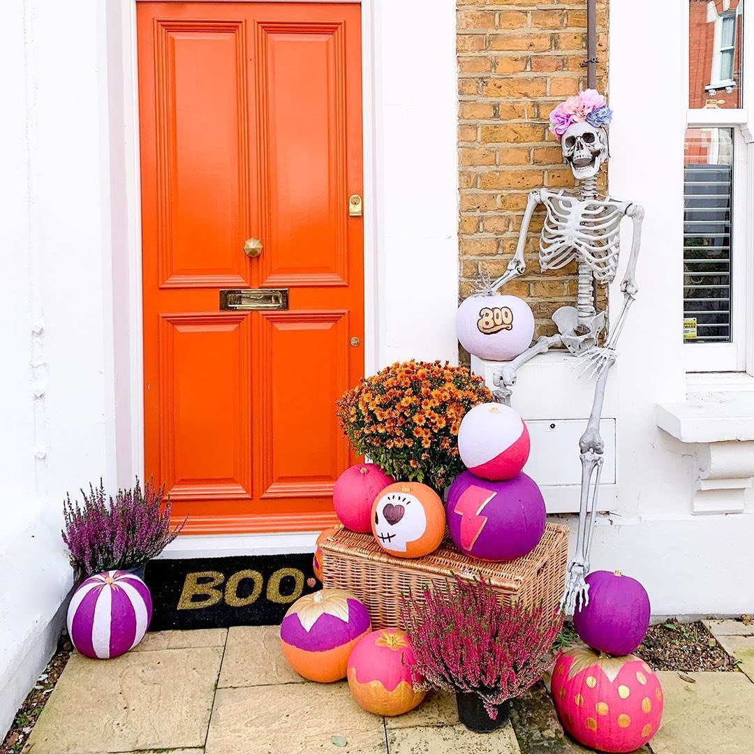 Vibrant Skeleton Greeting with Colourful Pumpkins