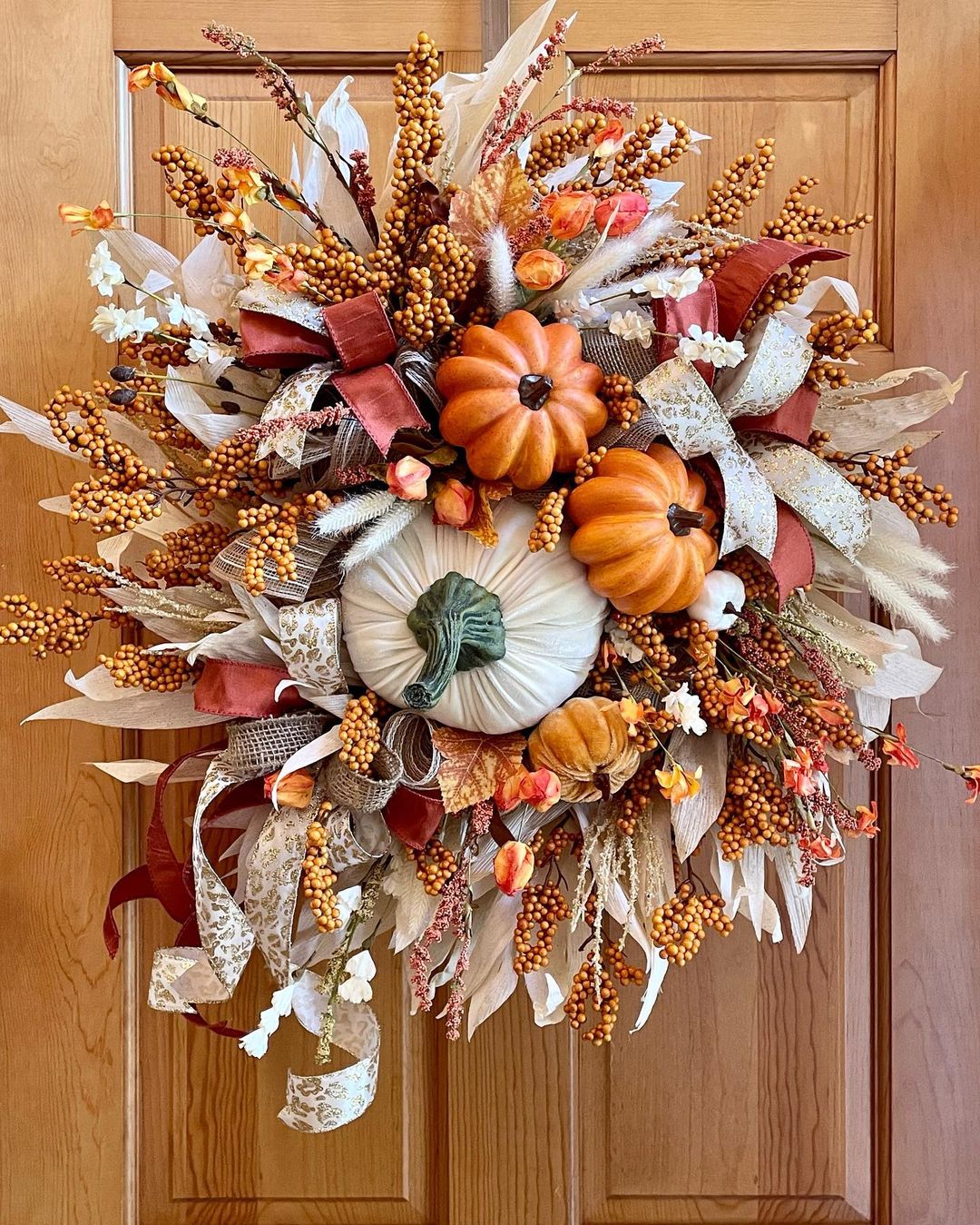 Lush Rustic Fall Wreath Featuring Pumpkins and Berries