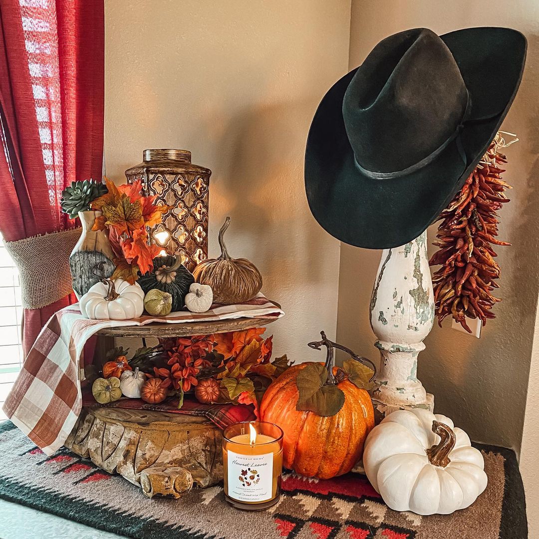 Western Flair to Your Rustic Fall Decor with Layered Textures and Warm Lighting