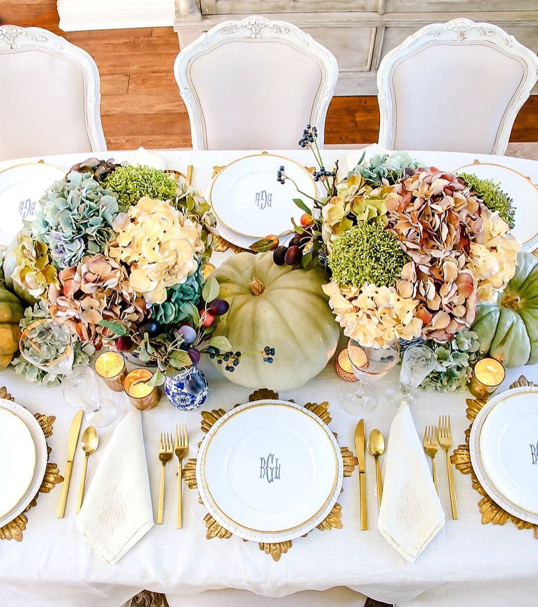 Elegant Thanksgiving Table with Lush Florals and Personalized Touches