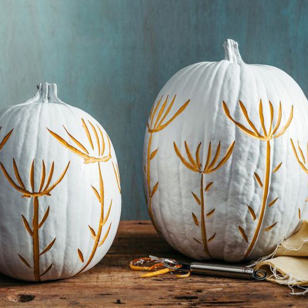 Minimalist Carved Floral Designs on White Pumpkins