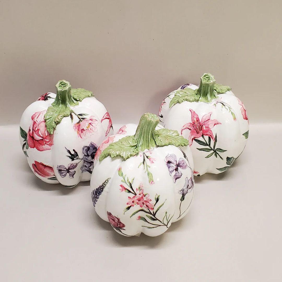 Soft Floral Accents on Classic White Pumpkins