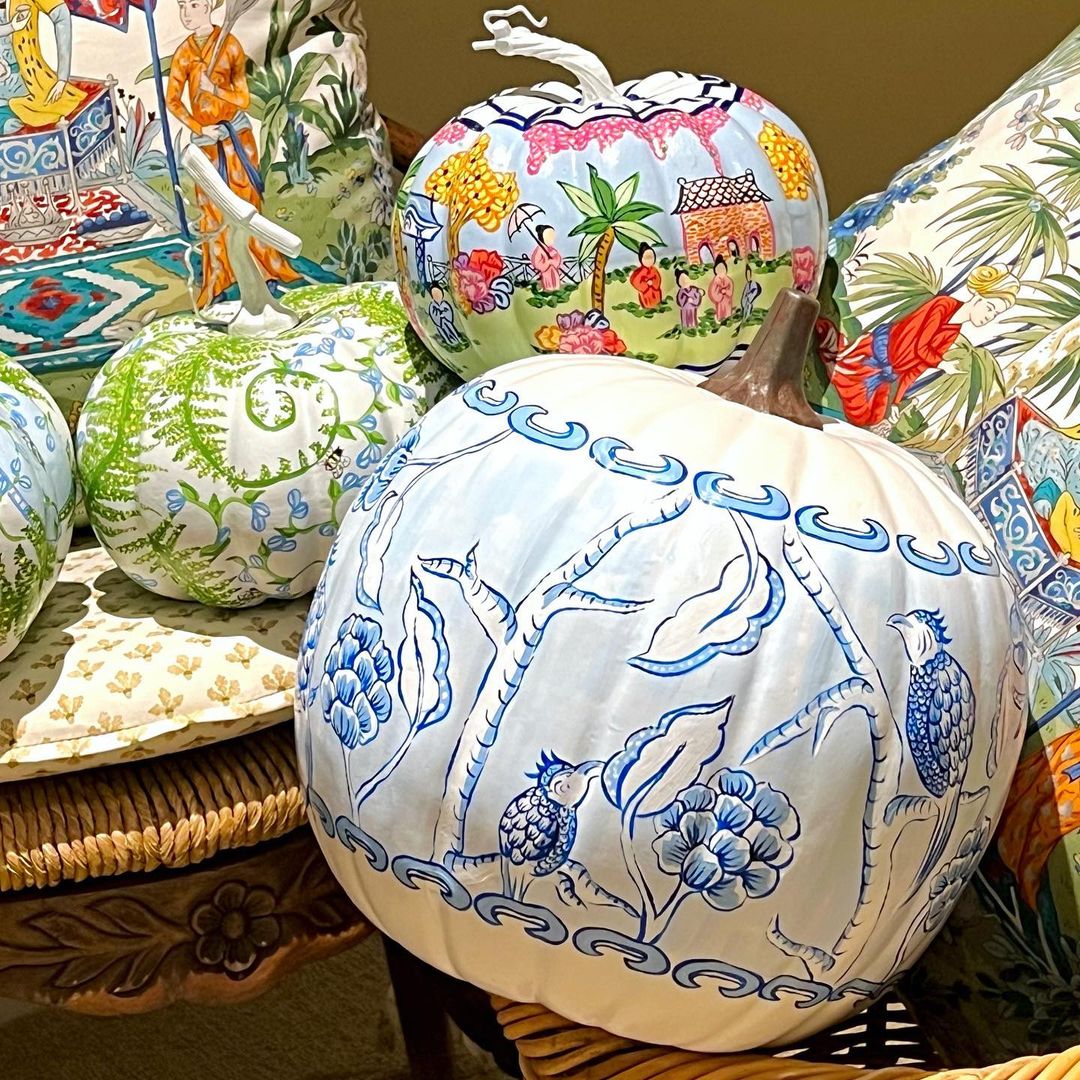 Intricate Storytelling on White Pumpkins with Hand-Painted Scenes