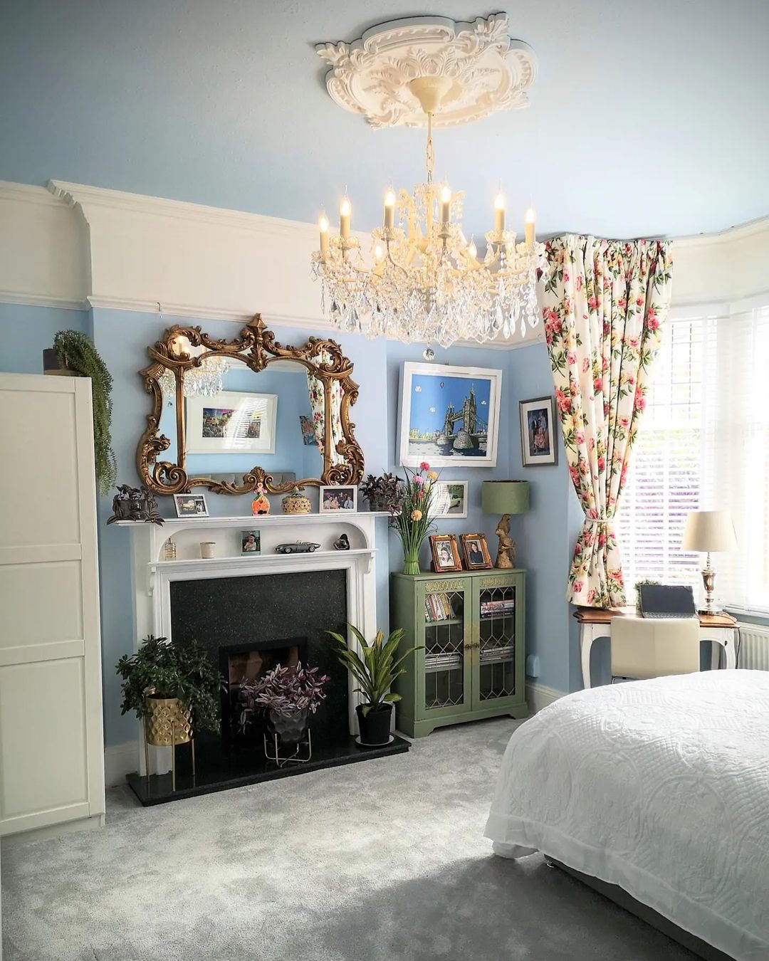 Victorian Bedroom with Chandeliers and Floral Charm