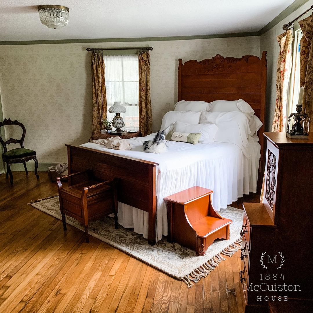 Victorian Bedroom with Carved Wood and Vintage Simplicity