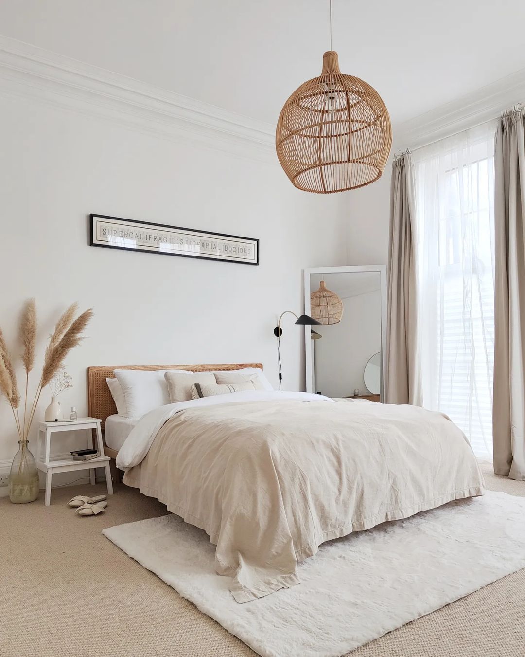 12. Minimalist White Bedroom with Natural Textures