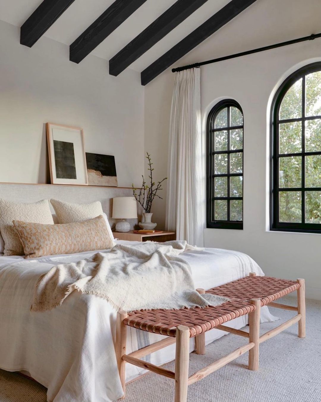 Rustic White Bedroom with Bold Architectural Details