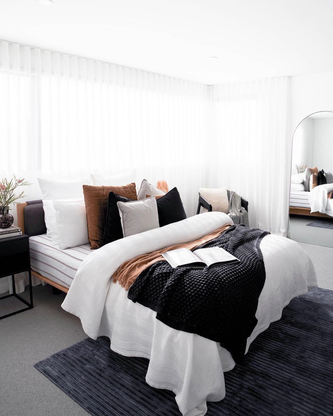 Modern White Bedroom with Cozy Layers