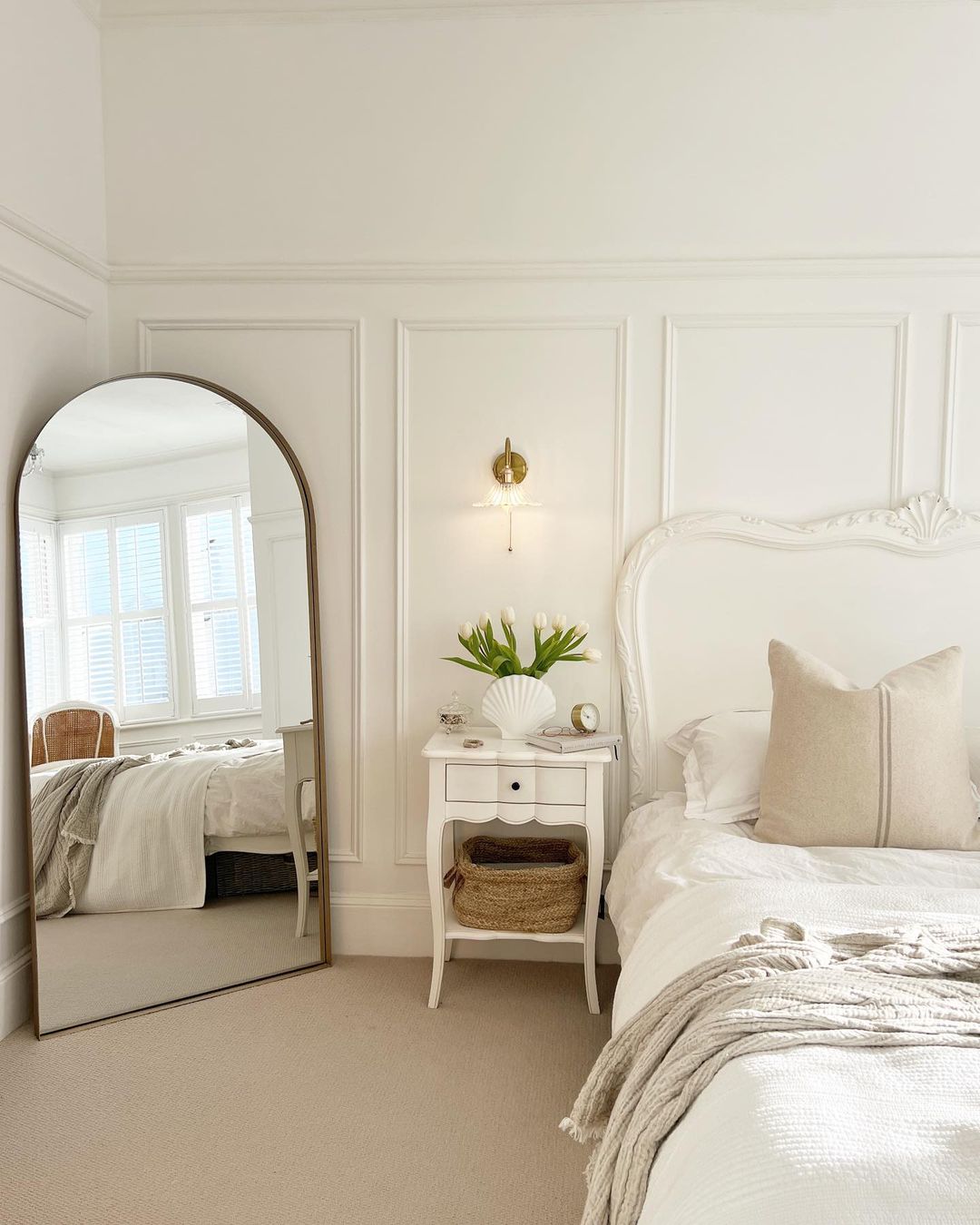 French-Inspired White Bedroom with Modern Accents